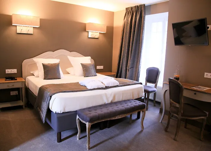 Le Lion D'or Et Restaurant La Table Du Lion 4*