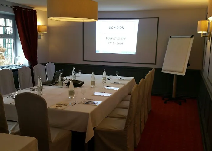 Отель Le Lion D'or Et Restaurant La Table Du Lion